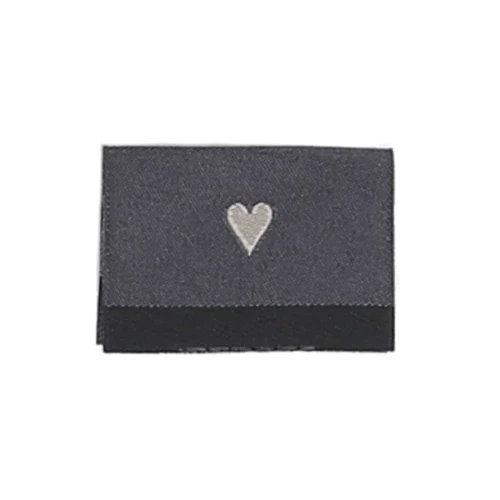 16173_Woven_labels_double_sided_35x19mm_Pink_Made_w_love_Bagside-1.w610.h610.fill.webp